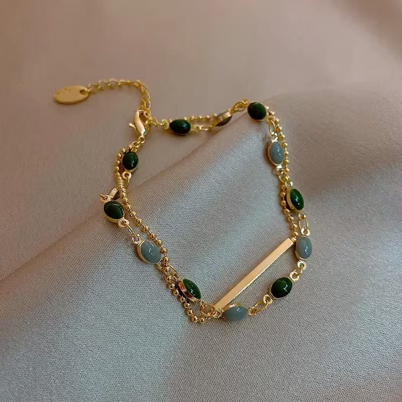 Dubbellaagse armband met groene edelsteen