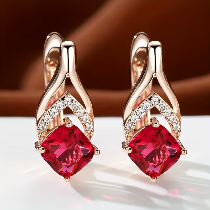 Wapenoorbellen met rood vierkant kristal