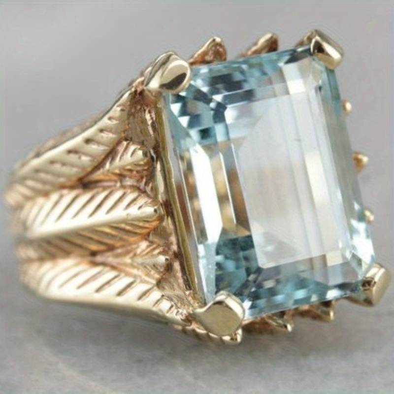 Emerald-Cut Blue Glass Ring with Engraved Gold-Tone Band