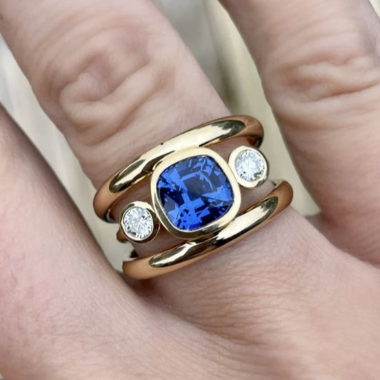 Gold-Tone Split Band Ring with Oval Blue Zirconia