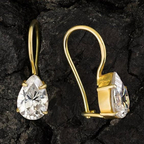 Boucles d'oreilles pendantes serties de verre blanc style vintage