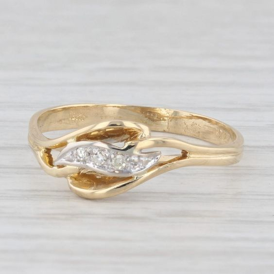 Wavy Gold-Tone Ring with Zirconia Swirl