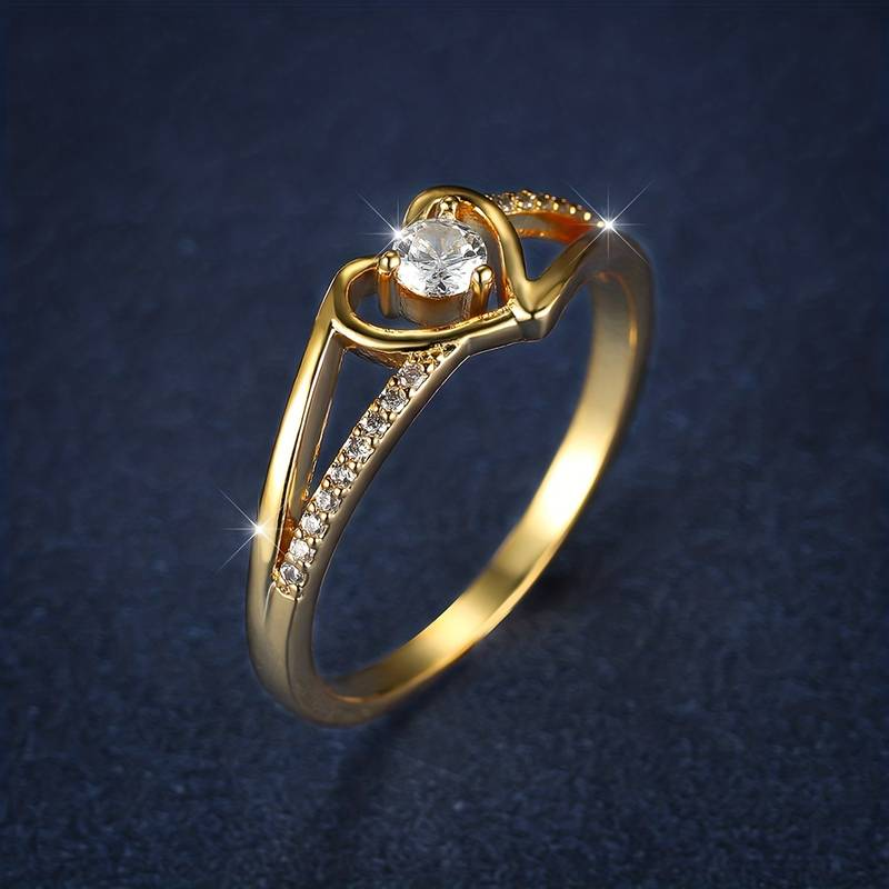 Vintage goudkleurige hartring met kristal