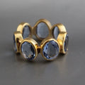 Gold-Tone Ring with Row of Blue Glass Bezels