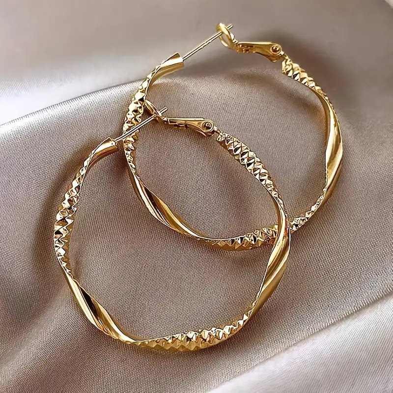 Large Thin Gold-Tone Wavy Hoop Earrings
