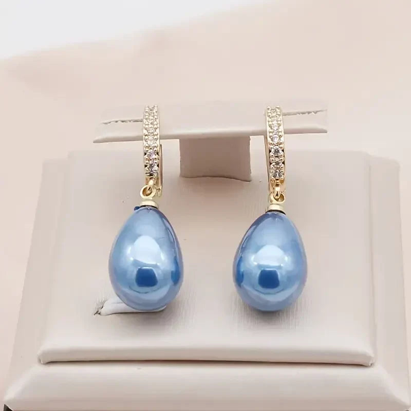 Blue Pearl Drop Earrings in Gold Tone