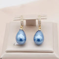 Blue Pearl Drop Earrings in Gold Tone