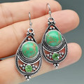 Mandala-oorbellen met groene steen