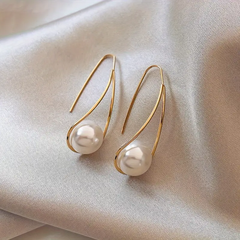 Oorhangers met parel en goudkleur