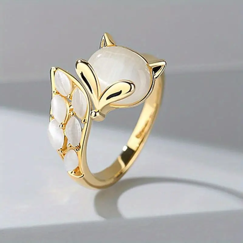 Goudkleurige ring met parel en katje