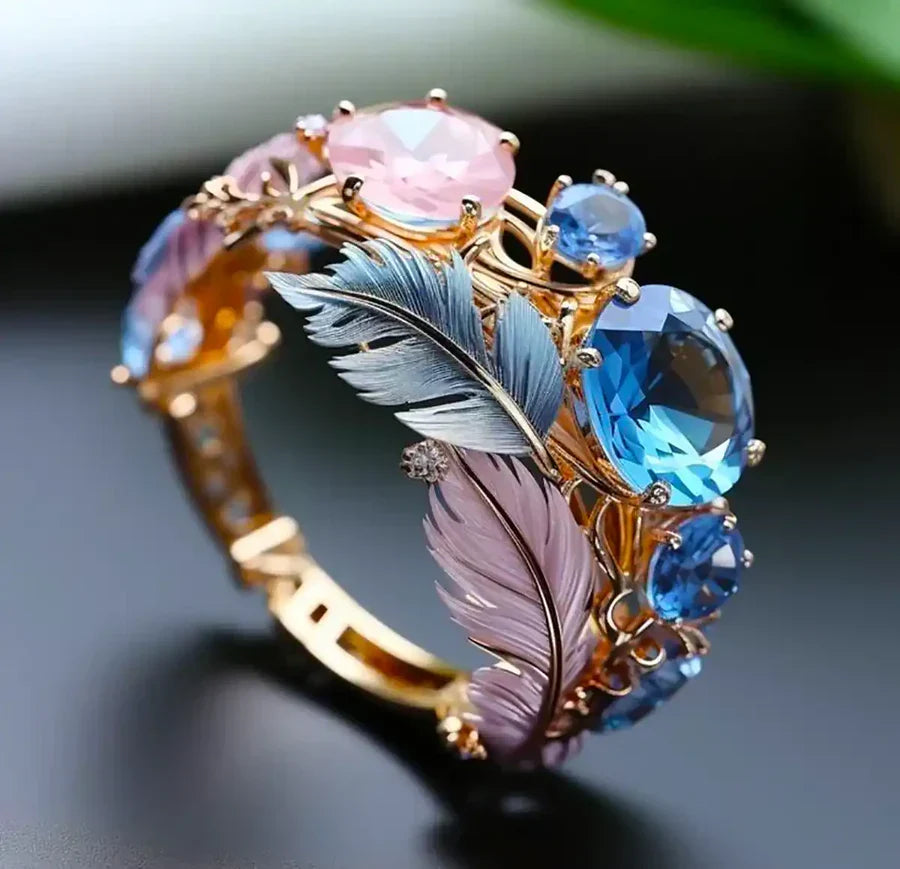 Antique-Style Feather Crystal Ring in Gold Tone