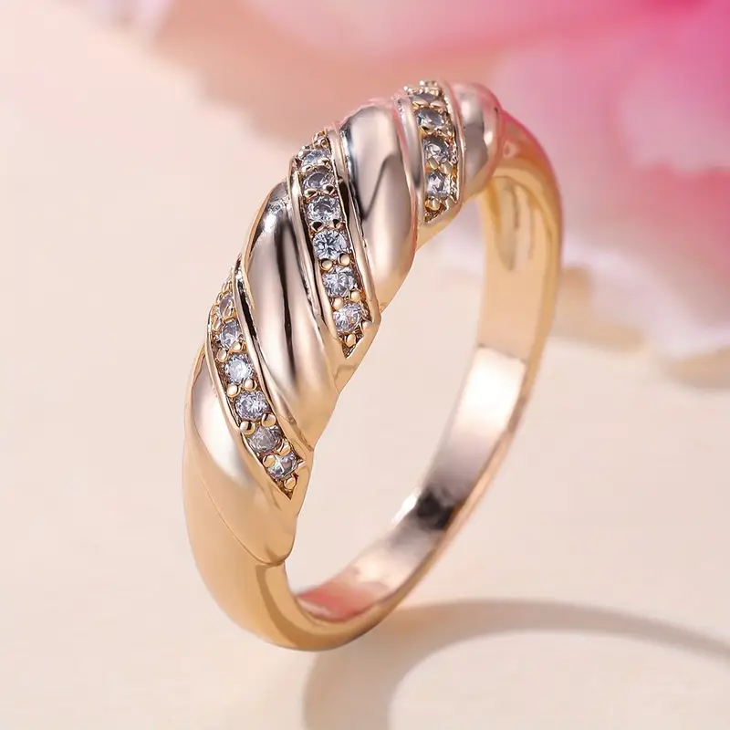 Gevlochten ring met rozenzirkonia