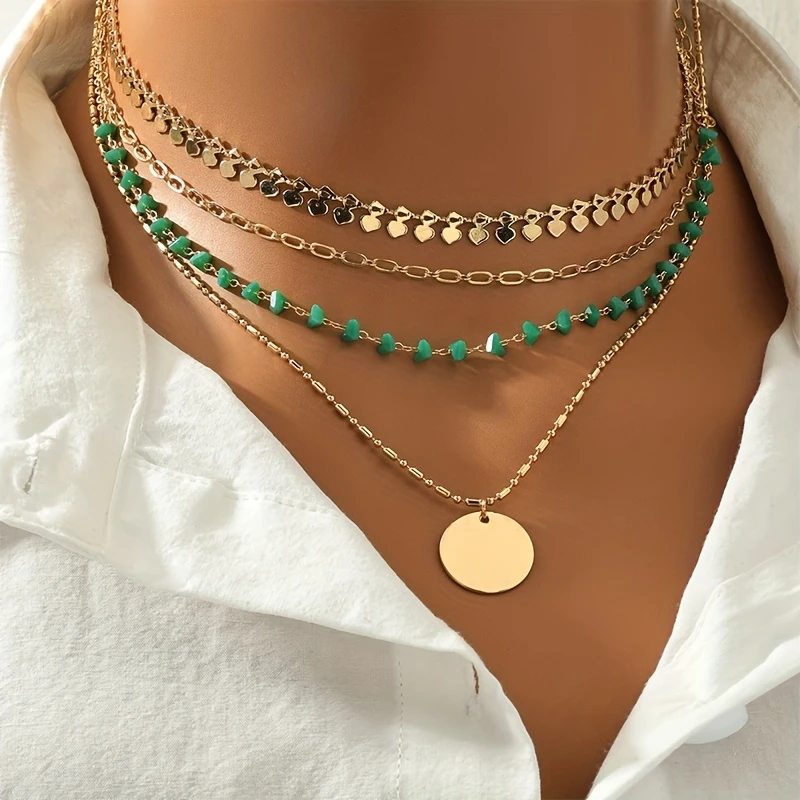 Gelaagde ketting in goudkleur en turquoise