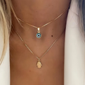 Goudkleurige gelaagde ketting met nazar-oog