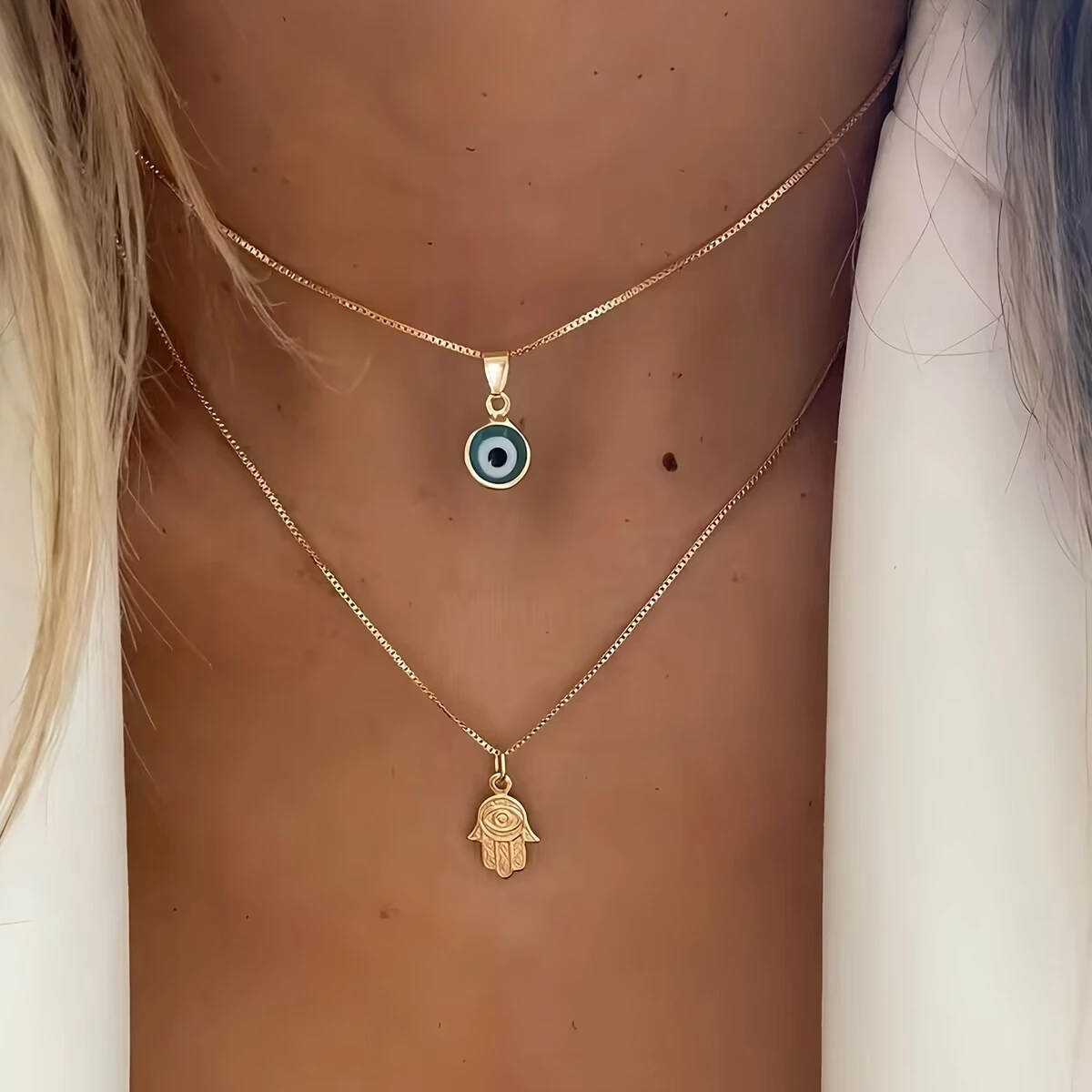 Goudkleurige gelaagde ketting met nazar-oog