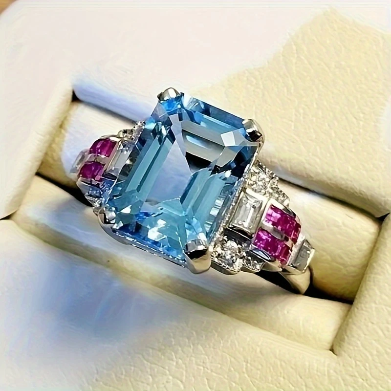 Bright Blue and Garnet Crystal Ring