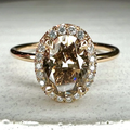 Ronde goudkleurige ring met glas