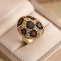 Ronde ring met ingelegd donker en wit glas