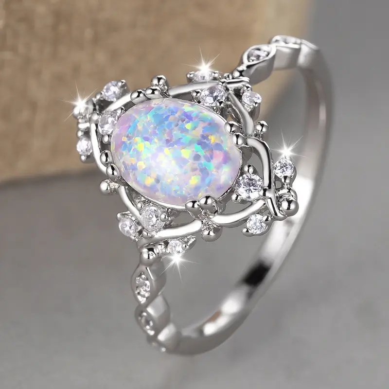 Ronde stralende ring met opaallook