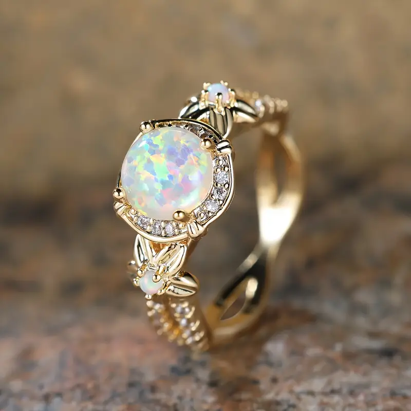 Ronde fonkelende ring met witte opaallook