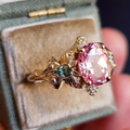 Pink Stone Gold-Tone Ring with Exotic Design