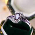 Zilverkleurige baanring in violet