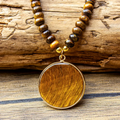 Ketting met ronde bruine steen
