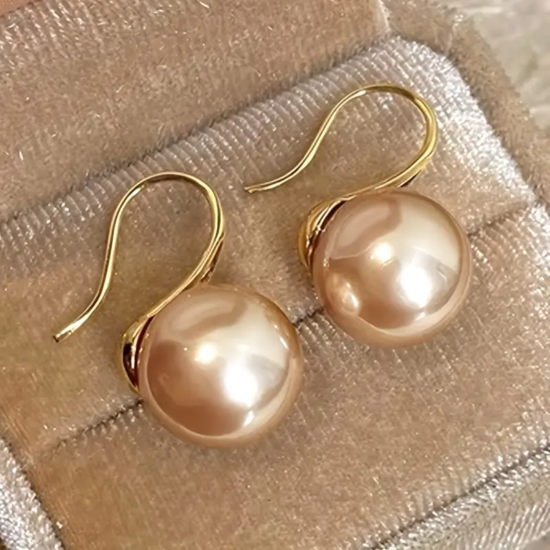 Rosé oorhangers met parel