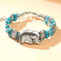 Silver-Tone Elephant Bracelet with Blue Accents