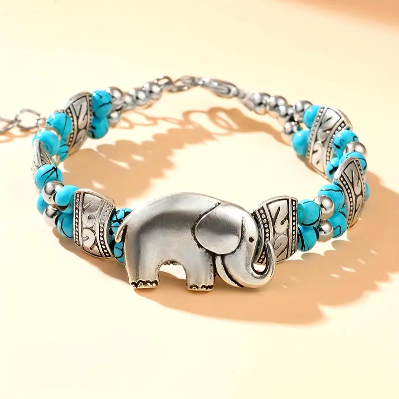 Silver-Tone Elephant Bracelet with Blue Accents