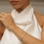Goudkleurige armband met ronde kristallen