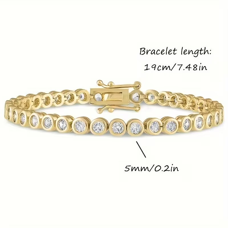 Goudkleurige armband met ronde kristallen