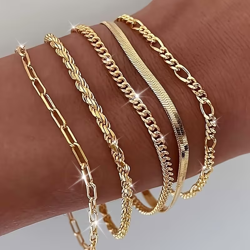 Goudkleurige tennisarmband met balletjesketting