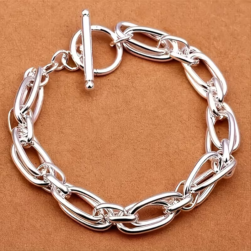 Zilverkleurige schakelarmband met clipschakels