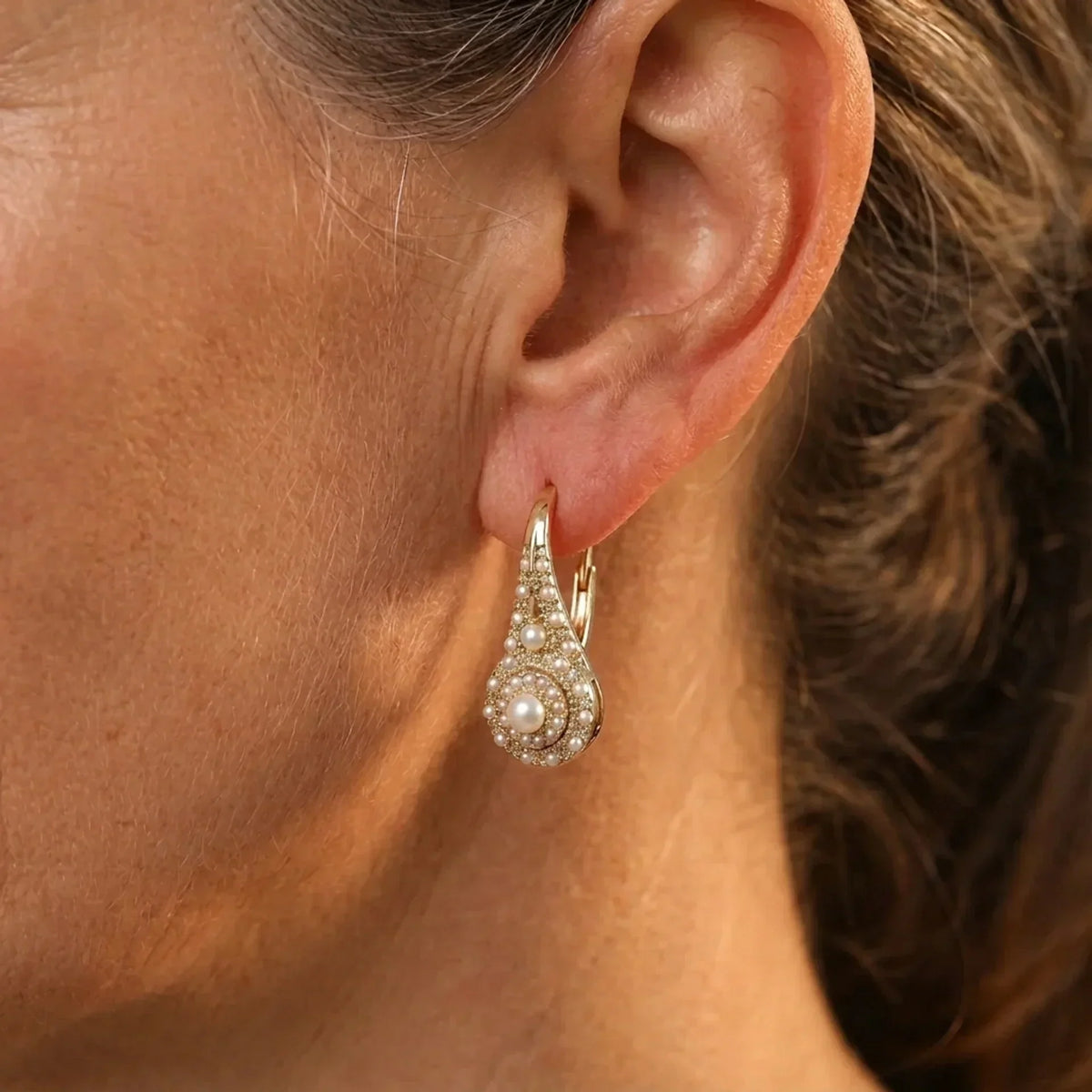 Vergulde turquoise bloesemoorbellen