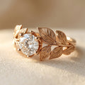 Koperkleurige ring met handgesneden bloemen