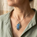 Vintage-Style Blue Stone Oval Pendant with Silver-Tone Frame