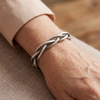 Gevlochten zilverkleurige armband