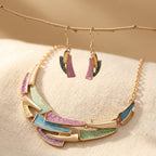 Vintage set van geometrische schakeloorbellen en ketting
