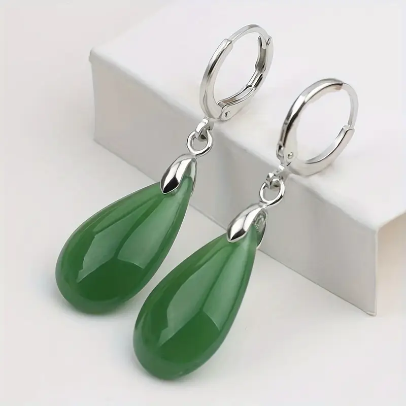 Vintage zilverkleurige oorbellen met groene waterdruppel