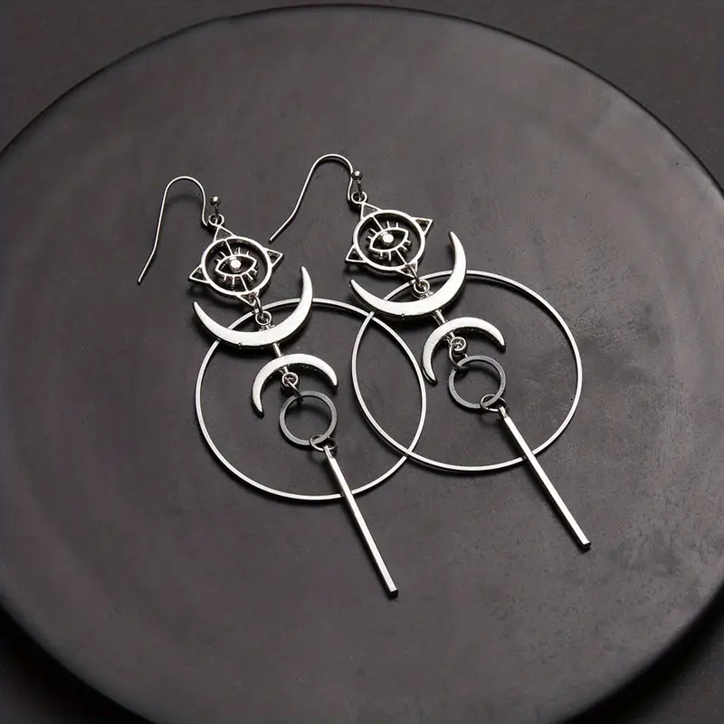 Boho zilverkleurige oorhangers met spiraalcirkel