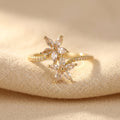 Open Gold-Tone Ring with Zirconia Flower and Leaf