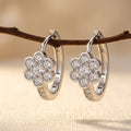 925 Sterling Silver Moissanite Flower Huggie Earrings