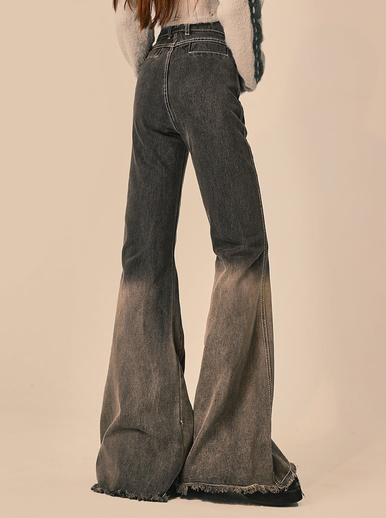 Flared jeans met vintage wassing en een beenverlengende lijn