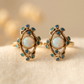 Inel vintage placat cu aur, cu cristal cu aspect de opal albastru