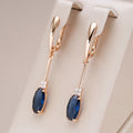 Blue Oval Crystal Long Drop Earrings in Rose Gold Tone