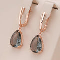 Dark Green Teardrop Crystal Earrings in Rose Gold Tone