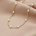 Gold-Tone Chain Necklace with Spaced Pearls