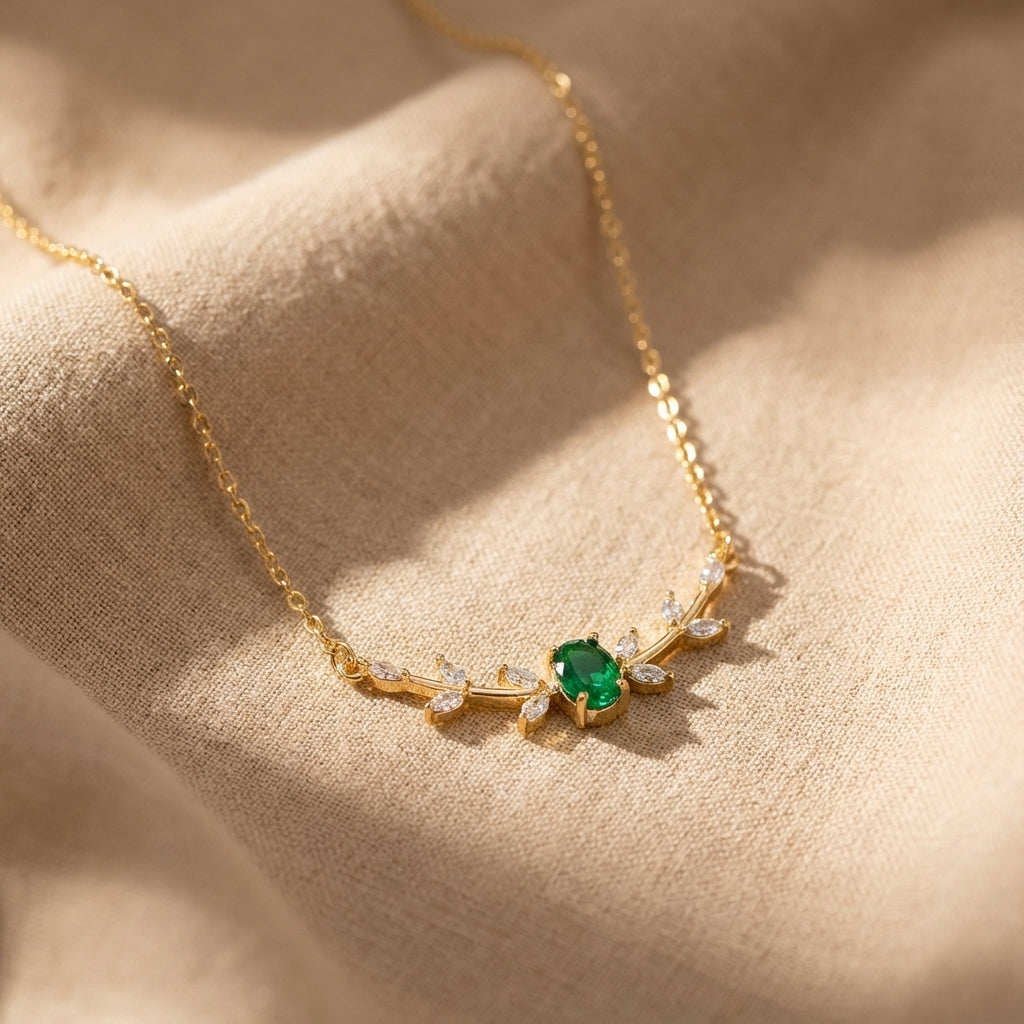 Gold-Tone Necklace with Green Leaf Accent