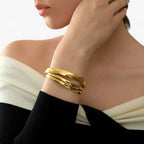 Gladde ronde armband in 18K goudkleurig roestvrij staal